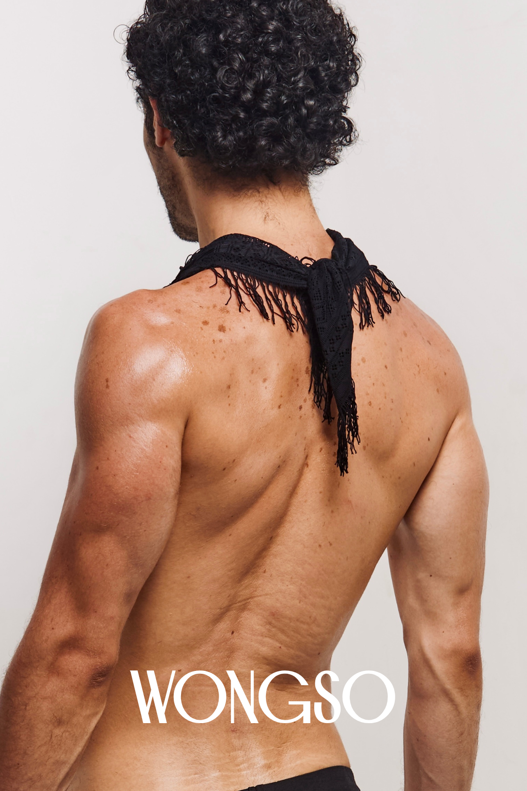 Model styling black lace bandana for festival look