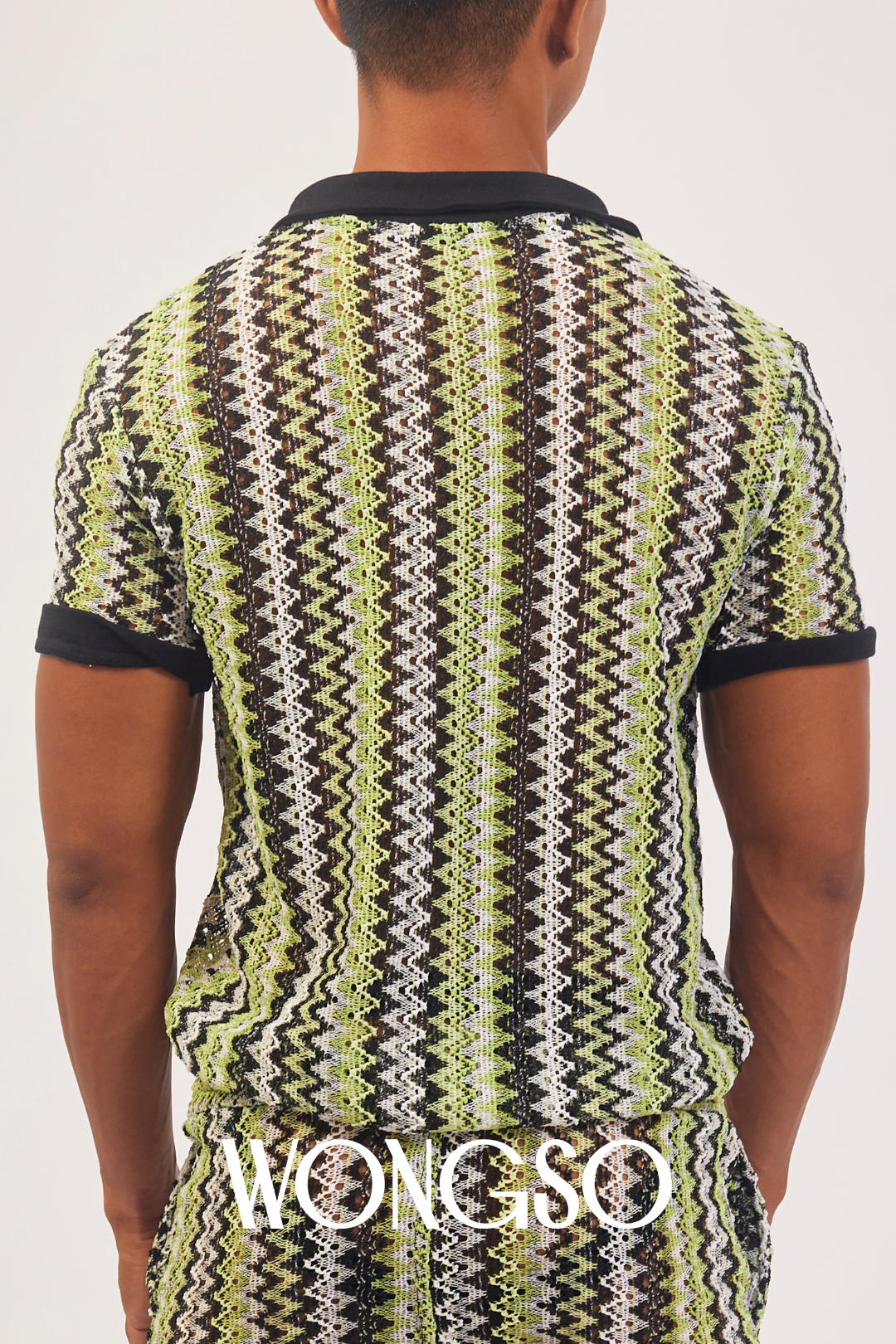 Lightweight knit polo for men in soft green, styled for beach party or casual queer fashion