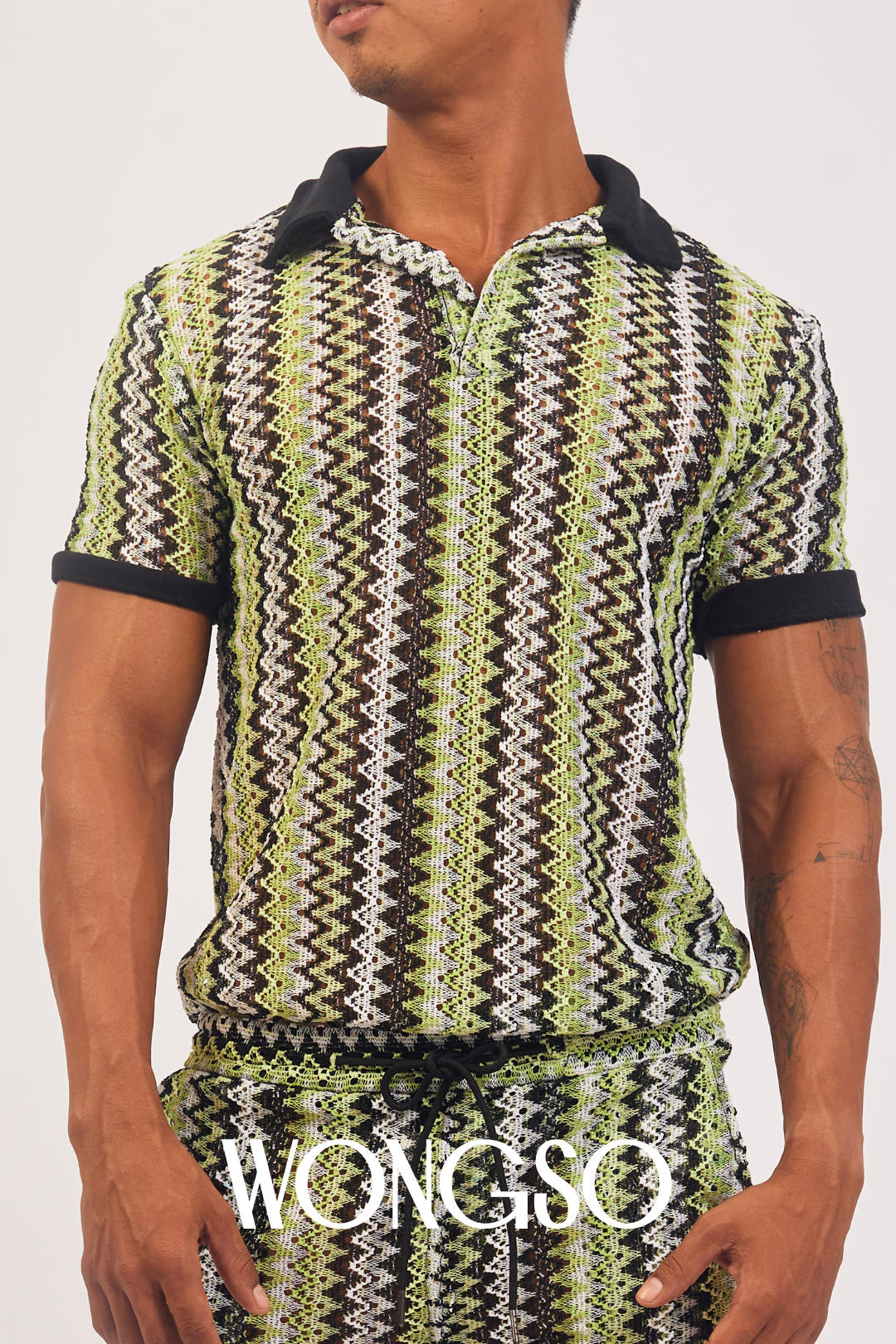 Queer model in sage green knit polo shirt – breathable men’s summer wear by WONGSO