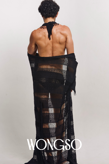 Back view of model walking in sheer lace robe for men