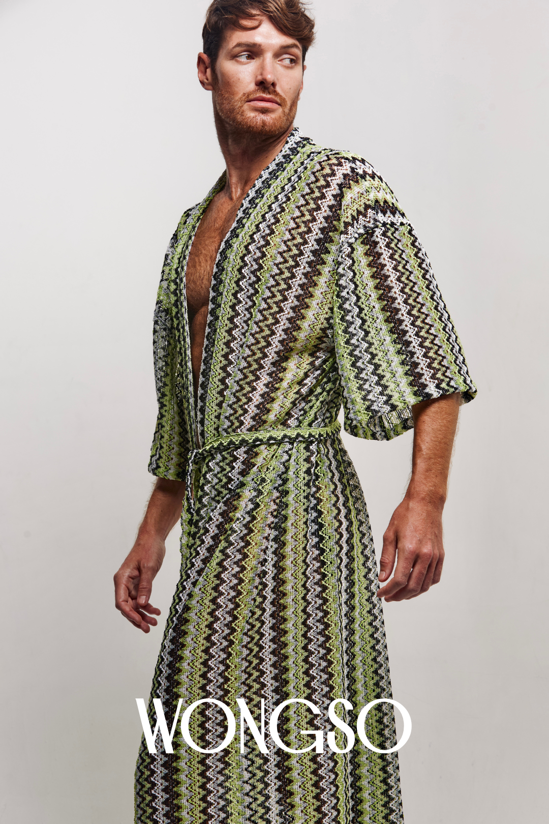 Detail of green knit texture and open sleeves